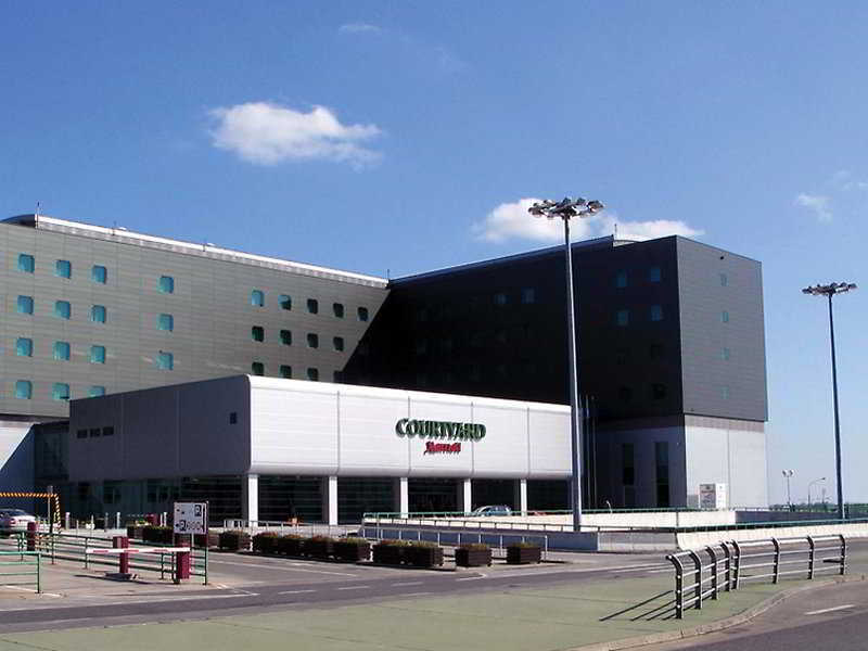 Courtyard By Marriott Warsaw Airport Hotel Exterior photo The hotel in 2007