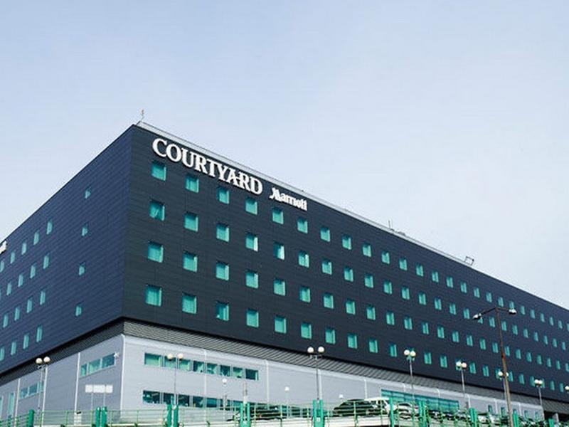 Courtyard By Marriott Warsaw Airport Hotel Exterior photo Marriott Courtyard